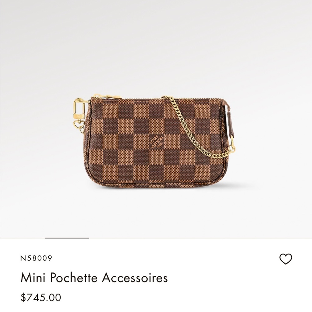 The Mini Pochette Accessoires in Damier Ebene canvas